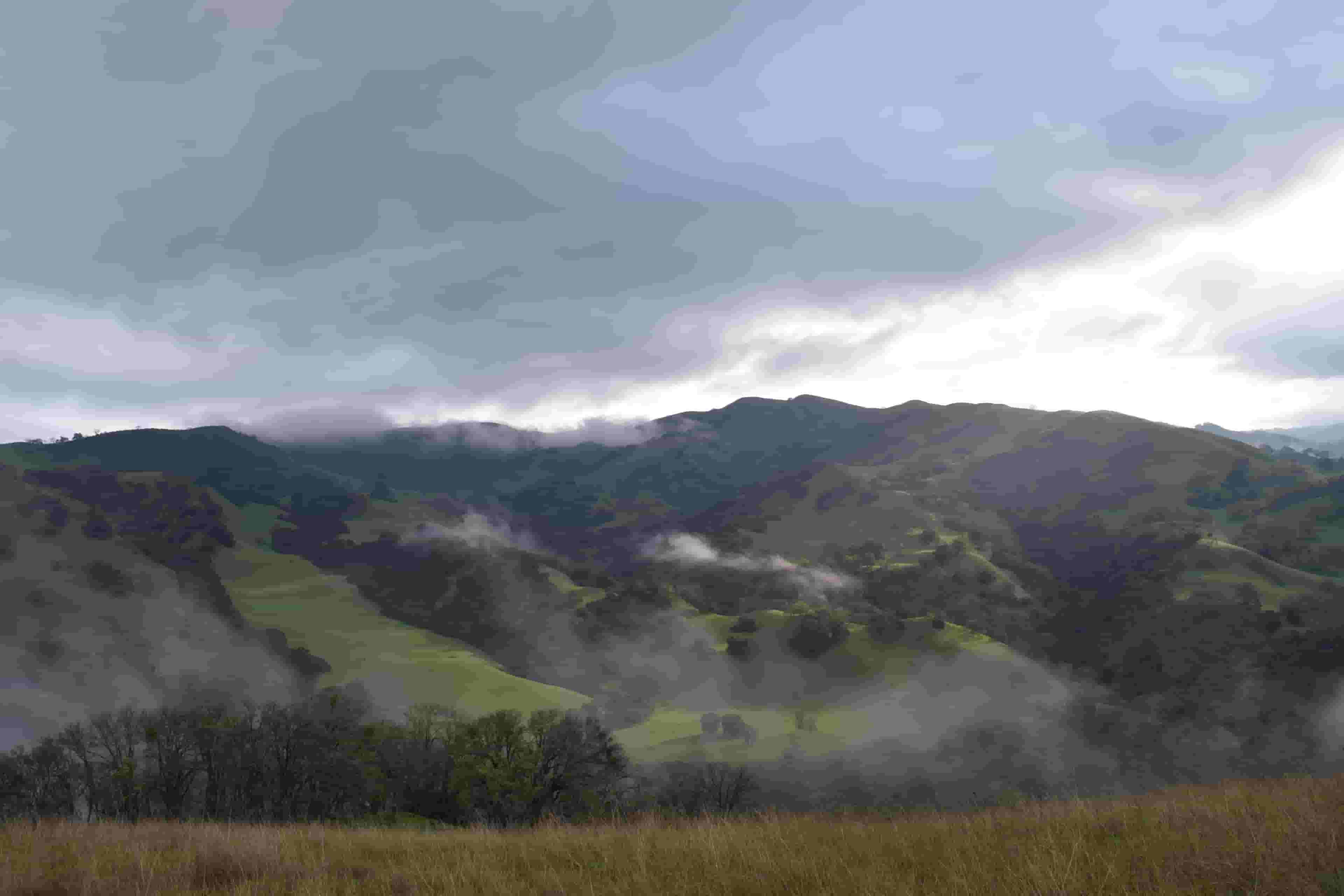 Morning fog rolling over the hills